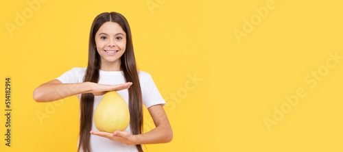 happy teen girl with pomelo citrus fruit. vitamin and dieting. Child girl portrait with pomelo grapefruit orange, horizontal poster. Banner header with copy space.