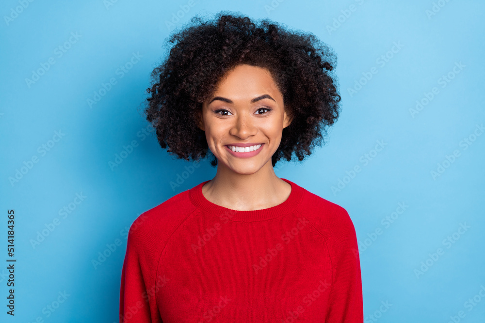 Photo of charming sweet young woman wear red sweater smiling isolated blue color background Photo of charming sweet young woman wear red sweater smiling isolated blue color background