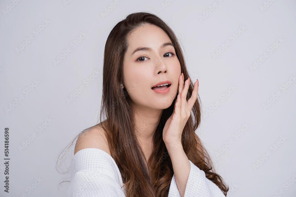 Beautiful smiling asian women with clean fresh skin look away. girl beauty face care. Facial treatment. Skin care. Cosmetology, beauty and spa.