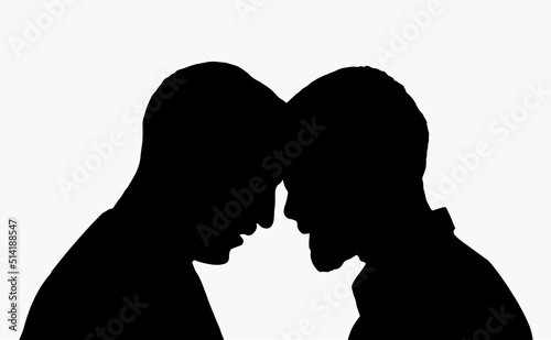 Portrait silhouette of two young people touching each other
