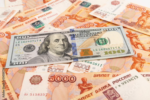 US Dollar and Russian ruble. Money background. Currency exhange. Economic crisis. Rouble dollar cash. Hundred dollar bill and 5000 rubles. Business and finance. Russia and USA