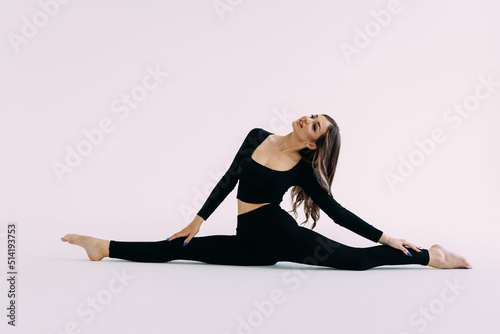 sport fitness woman, young healthy woman doing stretching exercises, full length portrait isolated over white background