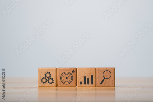 Wood cube with business global internet connection application technology and digital marketing icon.