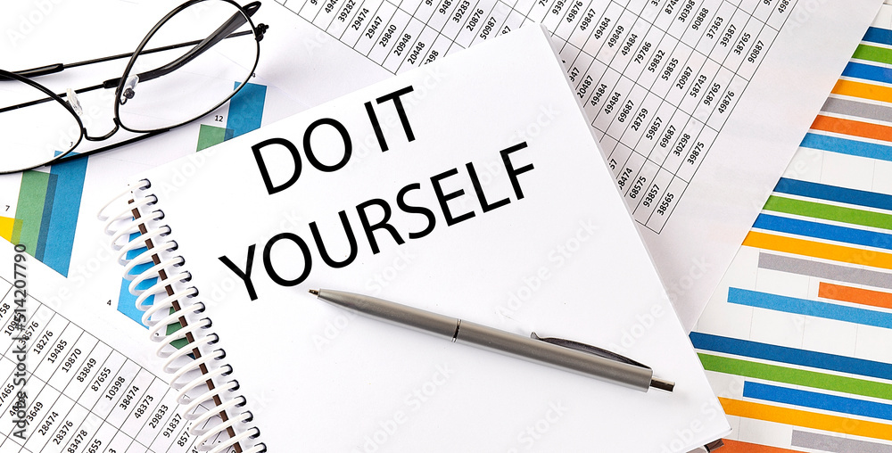 DO IT YOURSELF , pen and glasses on the chart, business concept