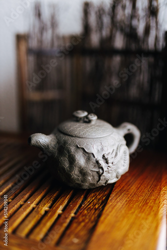 A light Chinese teapot in the form of a handmade dragon