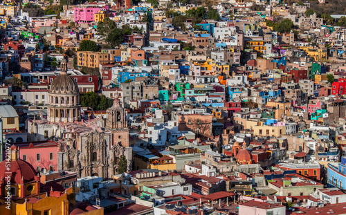 Ancient towers and dome of La Valenciana church. Panorama of colorful historical old town buildings in Guanajuato Mexico. Vivid, colonial neighborhood, traditional Mexican architecture. © Daniel
