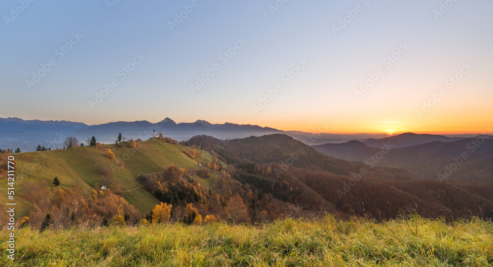Obraz premium Church in the hills in autumn. 