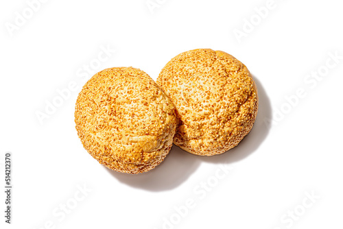 Fresh buns with sesame isolated on a white background. An indispensable ingredient for burgers