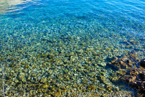 clean sea surface, bottom detail, sunny day, afternoon