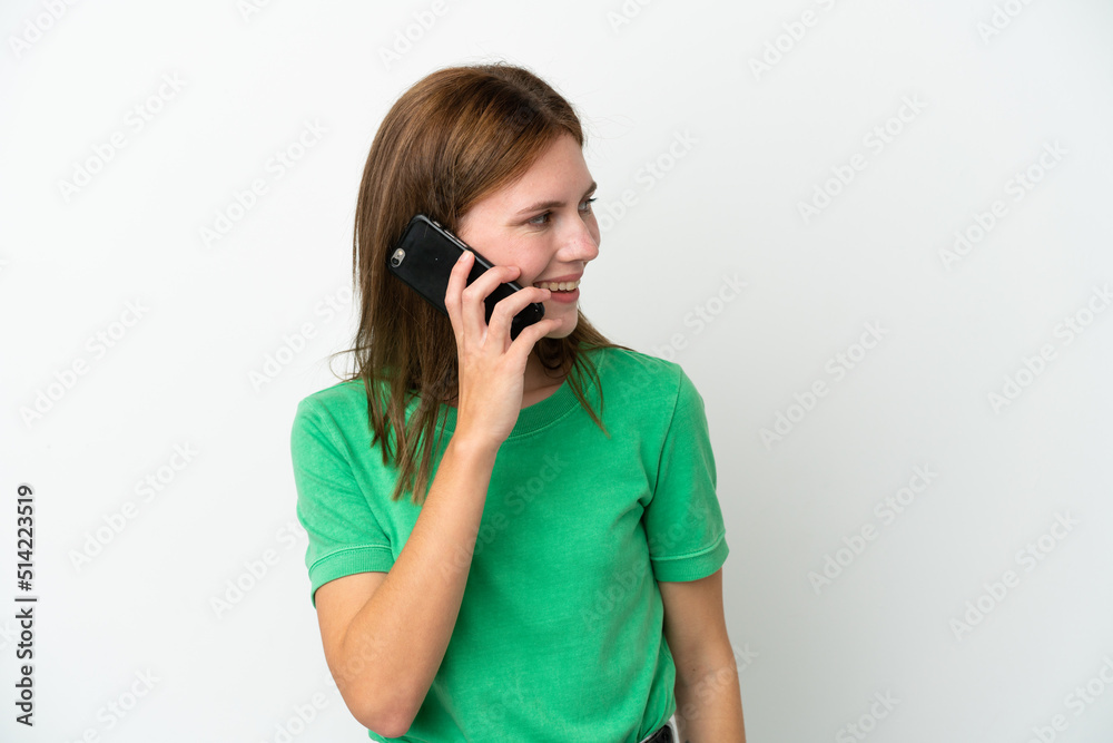 Young English woman isolated on white background keeping a conversation with the mobile phone with someone Young English woman isolated on white background keeping a conversation with the mobile phone with someone