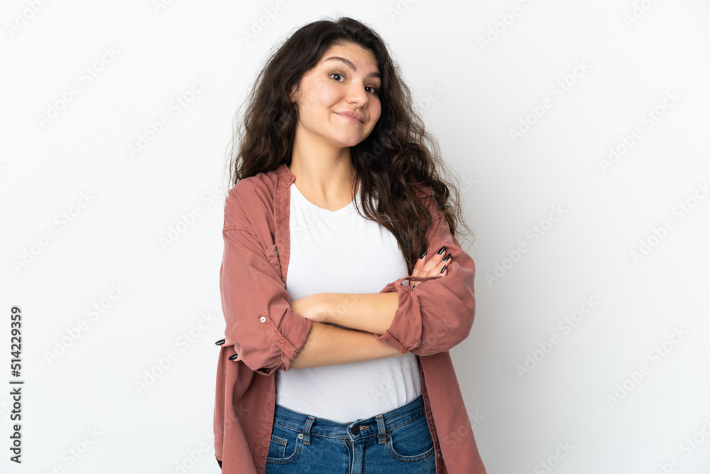 Teenager Russian girl isolated on white background making doubts gesture while lifting the shoulders Teenager Russian girl isolated on white background making doubts gesture while lifting the shoulders