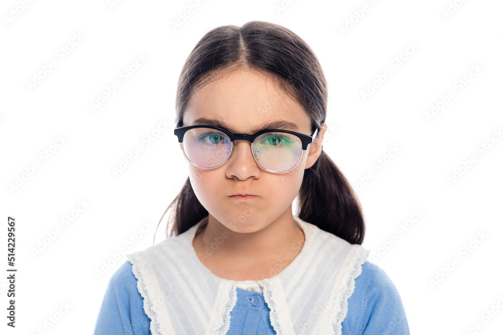 Portrait of angry schoolgirl in eyeglasses looking at camera isolated on white. Portrait of angry schoolgirl in eyeglasses looking at camera isolated on white.