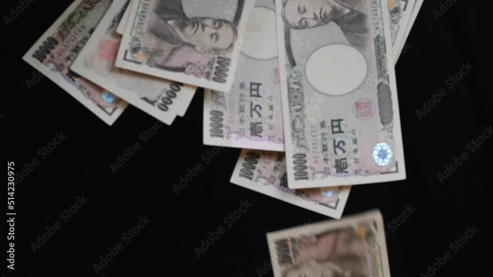 Closeup of Japanese accounting 1,000 yen banknotes money saving cash for the economy. Closeup of Japanese accounting 1,000 yen banknotes money saving cash for the economy.