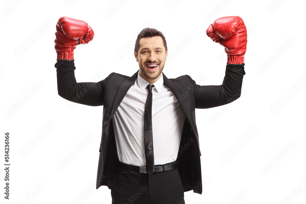 Portrait of a businessman with boxing gloves gesturing win Portrait of a businessman with boxing gloves gesturing win