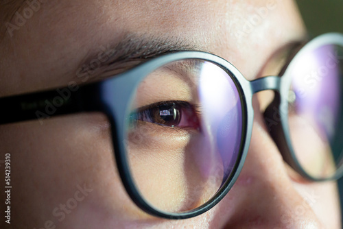 glasses and eyes,Tired woman in glasses works on internet. Migraine or headache after work in front of computer all day. Eye pain, dry eye syndrome