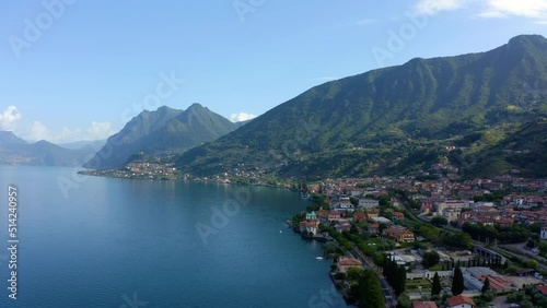 Aerial video with drone. Panoramic view of the resort town of Garda the north of Italy. Riva del Garda cityscape is town and comune in the Italian province of Trento of the Trentino Alto Adige region. photo