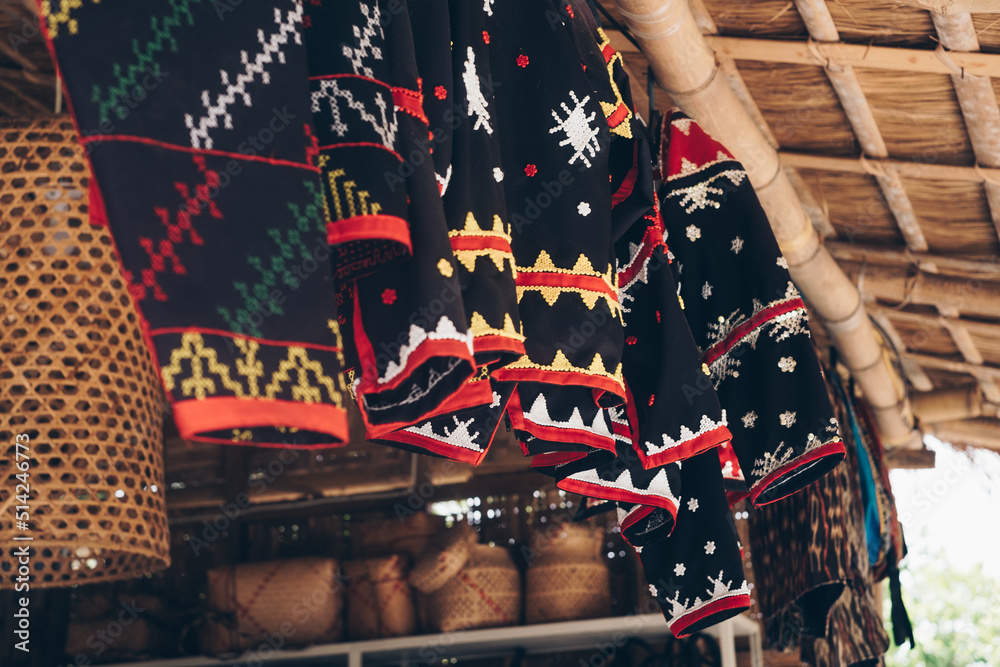 Hanging array of handmade traditional dress of the T'boli women called ...