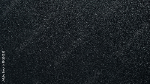 Seamless surface of black sponge foam as background, ethylene (eva) vinyl acetate sheet, sandpaper-like fine texture.