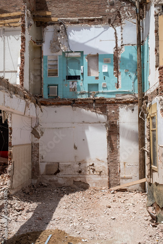  Demolition of old house reveals rooms on different floors, real estate speculation © Juan Garcia