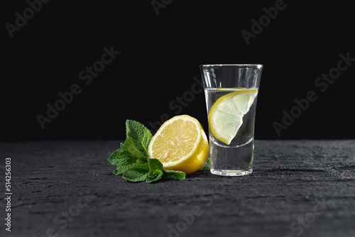 Mexican tequila, or whiskey on a dark background. The concept of a luxury alcoholic drink