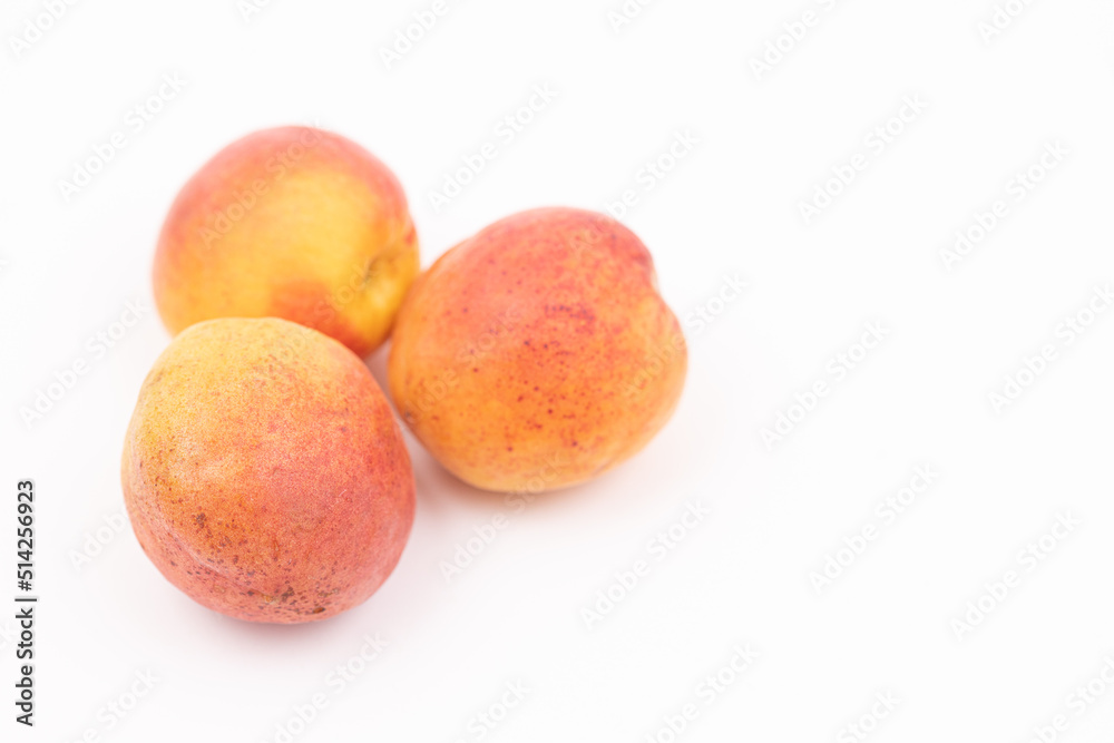 Fresh apricots isolated above white background with copy space Fresh apricots isolated above white background with copy space