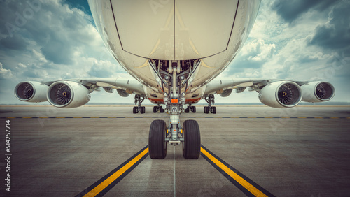 modern airliner against a dramatic sky photo