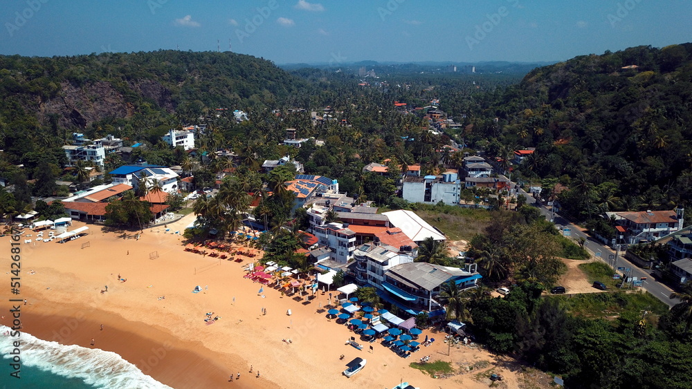Beach coastline in Unawatuna, Sri Lanka. Popular destination for tourists visiting Sri Lanka. Situated close to Galle and Mirissa