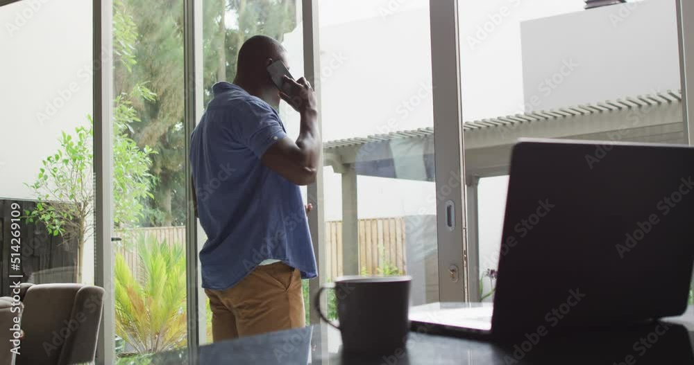 Vertical video of african american man using using smartphone Vertical video of african american man using using smartphone