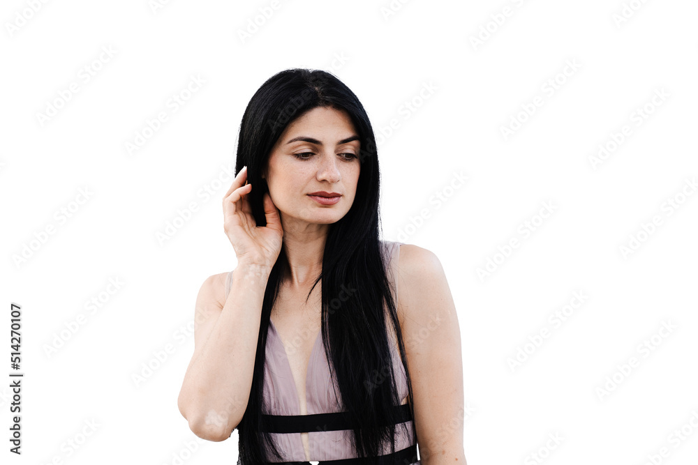 Tender Georgian woman in fashion dress posing on white background. Attractive girl is posing in studio. Tender Georgian woman in fashion dress posing on white background. Attractive girl is posing in studio.