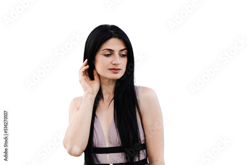 Tender Georgian woman in fashion dress posing on white background. Attractive girl is posing in studio.