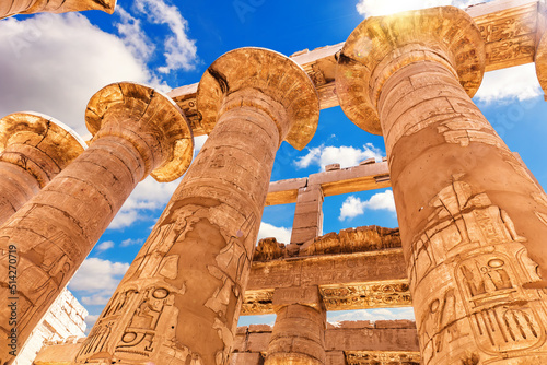 Obraz na płótnie Ancient Columns with beautiful carvings, Karnak Temple, the Great Hypostyle Hall, Luxor, Egypt w salonie
