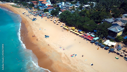 Beach coastline in Unawatuna  Sri Lanka. Popular destination for tourists visiting Sri Lanka. Situated close to Galle and Mirissa