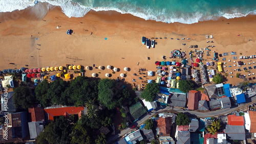 Beach coastline in Unawatuna, Sri Lanka. Popular destination for tourists visiting Sri Lanka. Situated close to Galle and Mirissa photo