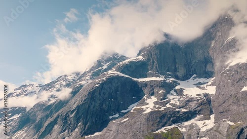 Troll wall covered in clouds. 