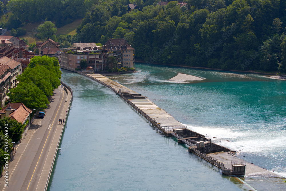 Aerial view of Aare River with watergate at City of Bern on a sunny summer day. Photo taken June 16th, 2022, Bern, Switzerland.