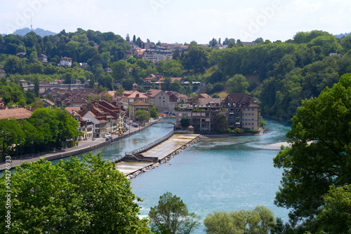 Aerial view of Aare River with watergate at City of Bern on a sunny summer day. Photo taken June 16th, 2022, Bern, Switzerland.