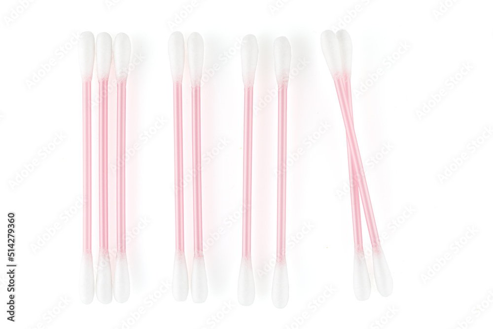 Cosmetic cotton swabs. Cotton buds with a plastic core on a white background. Full depth of field. Close-up. Cosmetic cotton swabs. Cotton buds with a plastic core on a white background. Full depth of field. Close-up.
