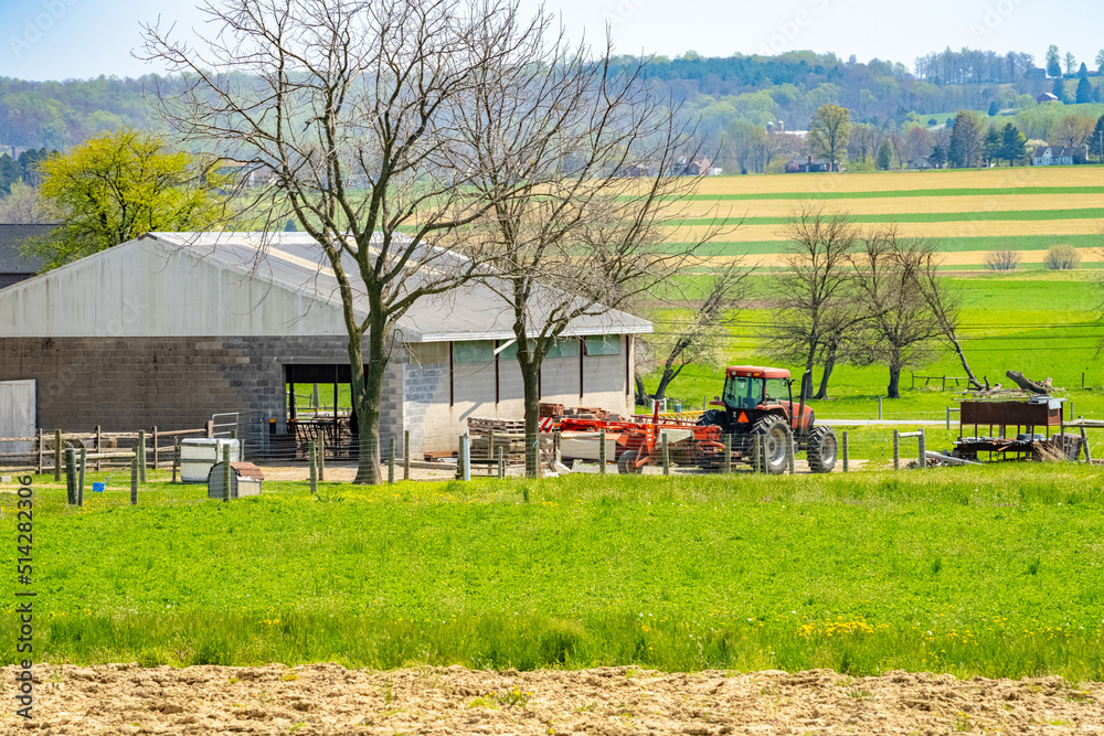 Fototapeta premium Amish country, farm, home and barn on field agriculture in Lancaster, Pennsylvania, PA US North America