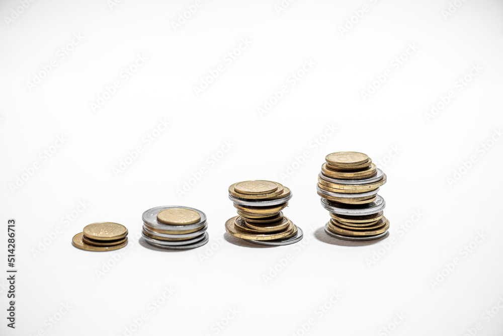 Euro Coin stacks on a white background , Finance and banking concept. Euro Coin stacks on a white background , Finance and banking concept.