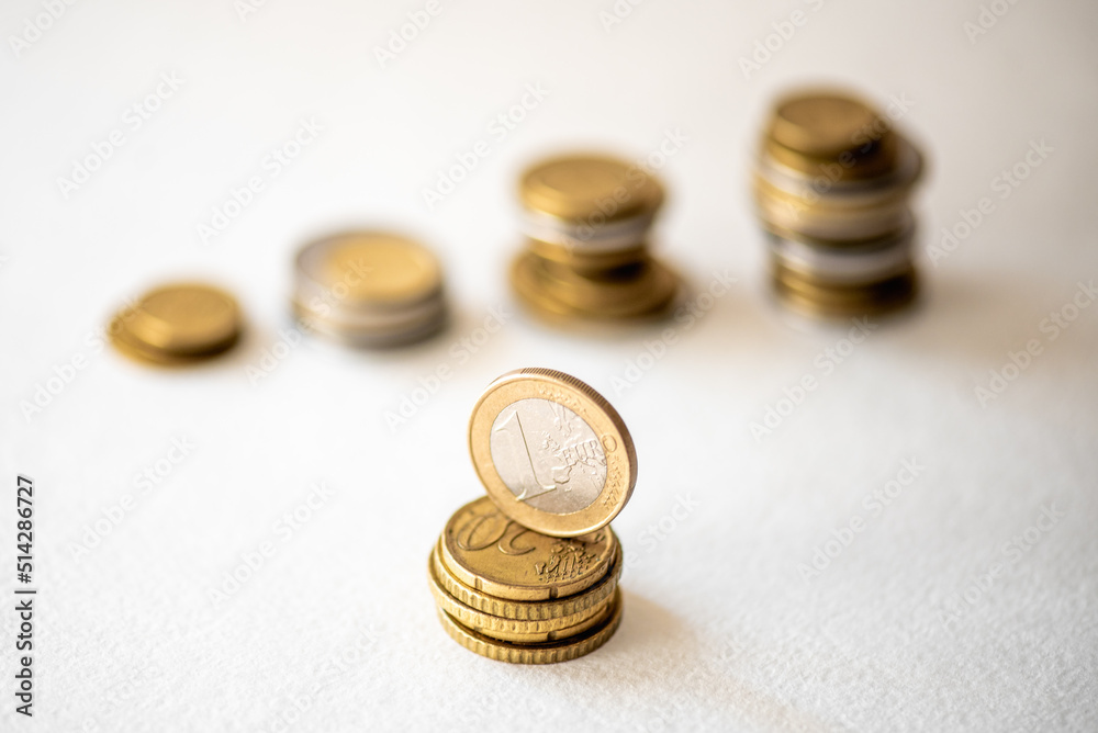 Euro Coin stacks on a white background , Finance and banking concept. Euro Coin stacks on a white background , Finance and banking concept.