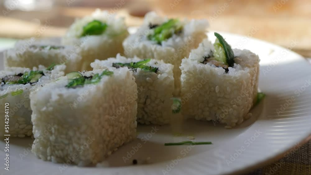 Close up California sushi roll. Japanese food 4k video Close up California sushi roll. Japanese food 4k video