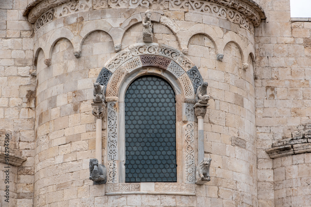 Exterior window of a romanesque church in Trani, Italy