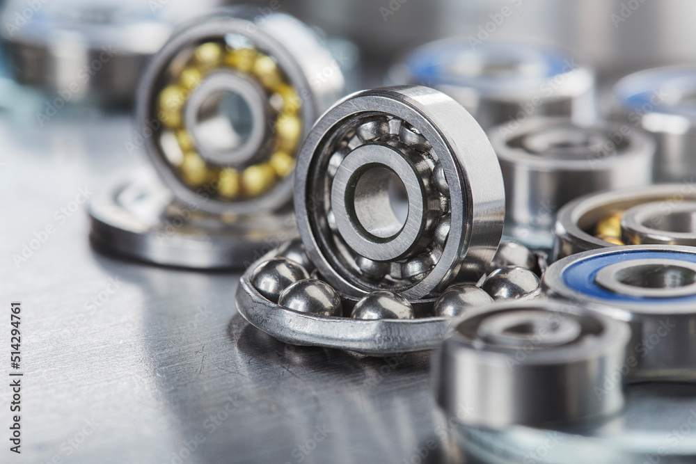 different bearings on a metal background. Part of mechanism. different bearings on a metal background. Part of mechanism.