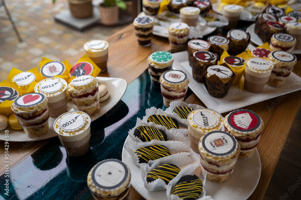 cakes sweets candy bar for guests in the restaurant on the catering table