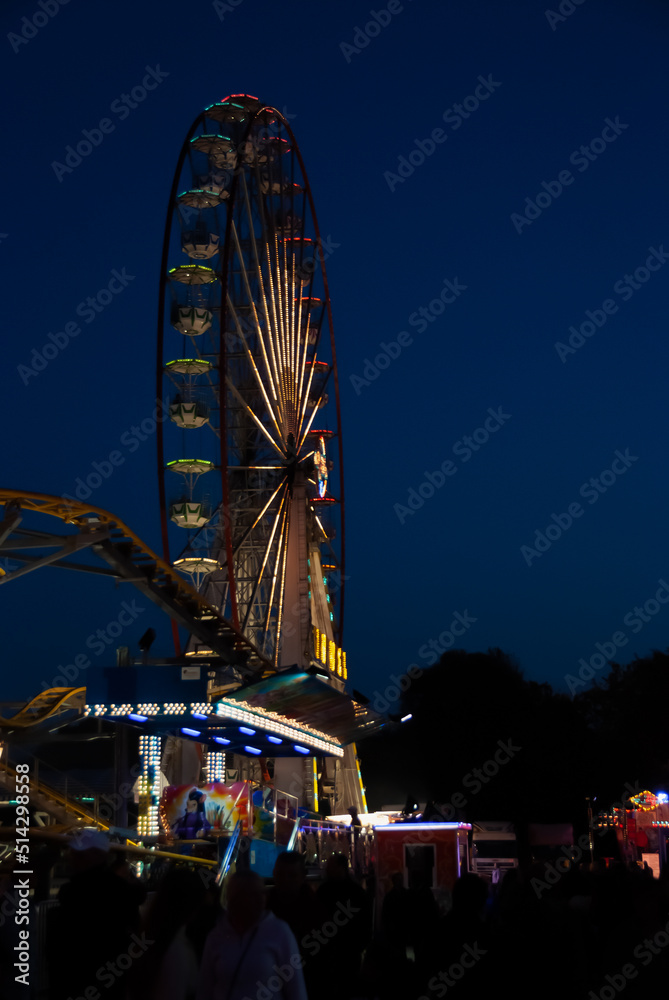 Obraz premium Fairground rides at night