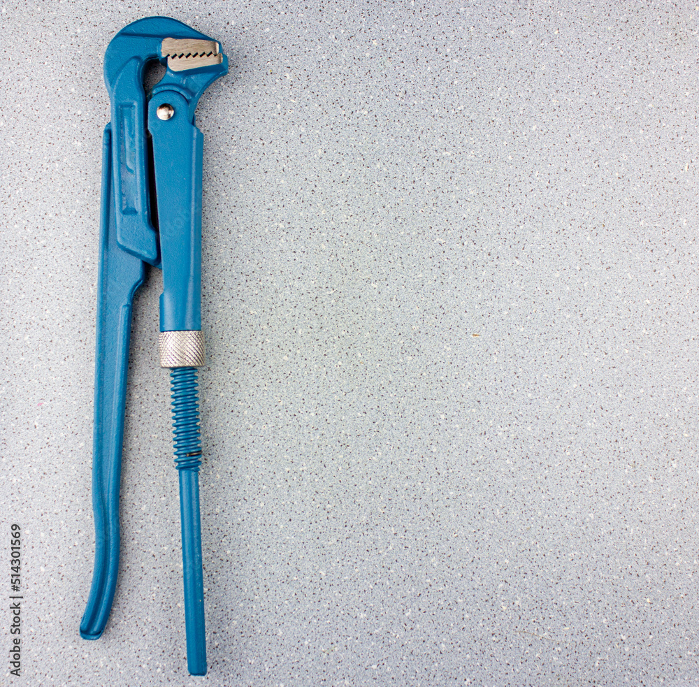 Pipe tool.Monkey wrench blank with space for text. Adjustable pipe wrapping tool. Metal tools socket wrench. Pipe tool.Monkey wrench blank with space for text. Adjustable pipe wrapping tool. Metal tools socket wrench.