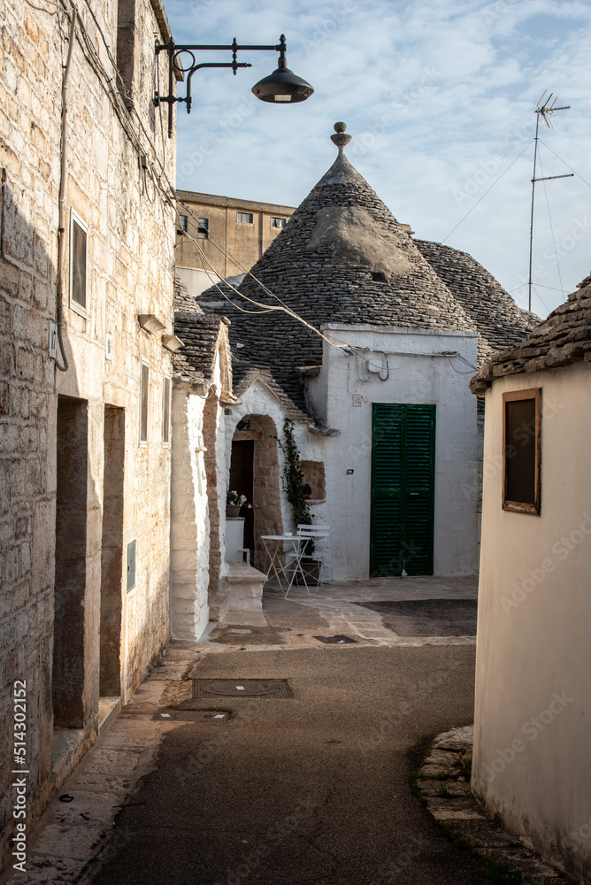 An abandoned alley with a trullo dwelling in Alberobello, Italy