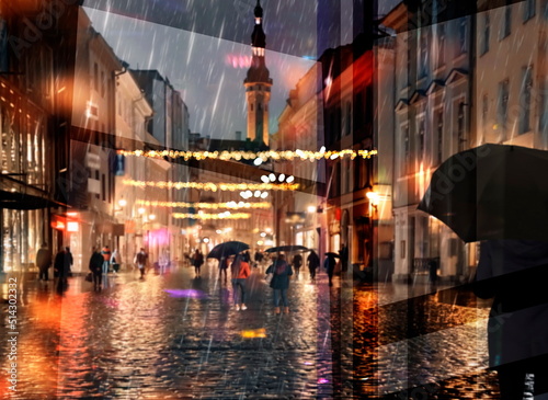 Photography abstract defocuses background rainy festive city night loght people walk with um