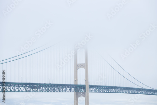 Mackinac Bridge in the fog, Michigan, USA photo