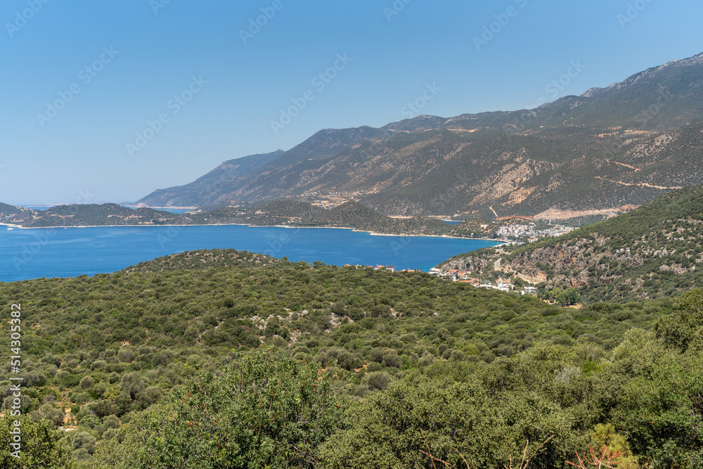 Aerial view of touristic Kas district with its green nature and deep blue sea. Antalya - Turkey
